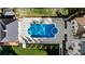 Aerial view of the pool area with a spa, patio, and manicured landscaping at 3488 Tuxedo Nw Rd, Atlanta, GA 30305
