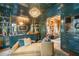 Well-appointed bar area with stylish furnishings and seamless access to adjacent rooms at 3488 Tuxedo Nw Rd, Atlanta, GA 30305