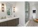 Contemporary bathroom featuring a marble countertop, stylish lighting, and a glass-enclosed shower at 3488 Tuxedo Nw Rd, Atlanta, GA 30305
