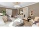 Bright bedroom with a Christmas tree, modern lighting, and ensuite bathroom at 3488 Tuxedo Nw Rd, Atlanta, GA 30305