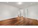 Bright room with hardwood floors, neutral walls, and doorways to other rooms at 3488 Tuxedo Nw Rd, Atlanta, GA 30305