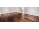 Spacious bedroom with hardwood floors and an open doorway at 3488 Tuxedo Nw Rd, Atlanta, GA 30305