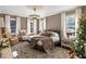 Cozy bedroom with an area rug, king bed and soft, natural lighting at 3488 Tuxedo Nw Rd, Atlanta, GA 30305