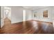 Light filled bedroom with hardwood floors and two windows with backyard views at 3488 Tuxedo Nw Rd, Atlanta, GA 30305