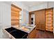 A custom closet featuring a stone island countertop and custom storage at 3488 Tuxedo Nw Rd, Atlanta, GA 30305
