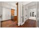Custom closet featuring dark hardwood floors and custom cabinets at 3488 Tuxedo Nw Rd, Atlanta, GA 30305