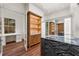 Bright closet space with hardwood floors, custom wood desk and vanity space at 3488 Tuxedo Nw Rd, Atlanta, GA 30305