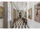 Grand entry hall with geometric tile floor and artwork at 3488 Tuxedo Nw Rd, Atlanta, GA 30305