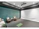 Home theater setup with a projector, screen, and comfortable seating area at 3488 Tuxedo Nw Rd, Atlanta, GA 30305