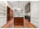 Spacious kitchen with custom wood cabinets, marble countertops, and stainless steel appliances at 3488 Tuxedo Nw Rd, Atlanta, GA 30305