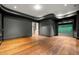 Open living space featuring hardwood floors, recessed lighting, and dark trim at 3488 Tuxedo Nw Rd, Atlanta, GA 30305