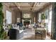 Cozy living room with fireplace, coffered ceilings, and comfortable seating area at 3488 Tuxedo Nw Rd, Atlanta, GA 30305