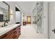 Main bathroom features marble counters, a glass shower and patterned tile flooring at 3488 Tuxedo Nw Rd, Atlanta, GA 30305