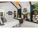 This main bedroom boasts exposed wood beams and a cozy fireplace at 3488 Tuxedo Nw Rd, Atlanta, GA 30305