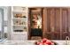 Walk-in pantry features custom storage, shelving, and a view to other areas of the home at 3488 Tuxedo Nw Rd, Atlanta, GA 30305