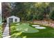 Landscaped backyard with private putting green at 3488 Tuxedo Nw Rd, Atlanta, GA 30305