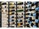 Close-up of a wine rack featuring an array of bottles, showcasing the extensive storage capacity at 3488 Tuxedo Nw Rd, Atlanta, GA 30305
