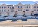 Charming townhomes featuring brick and siding accents, private garages, and beautifully landscaped surroundings at 3267 Durston Ct, Dacula, GA 30019