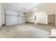Spacious garage featuring a large door at 3267 Durston Ct, Dacula, GA 30019