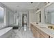 Elegant bathroom boasts double vanity, marble floors, and a large walk-in shower at 3609 Centerville Rosebud Rd, Snellville, GA 30039