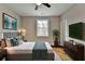 Comfortable bedroom with hardwood floors and a large window at 3609 Centerville Rosebud Rd, Snellville, GA 30039