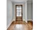 Hardwood floors and a beautiful wooden front door greet you at 3609 Centerville Rosebud Rd, Snellville, GA 30039