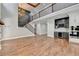 Open concept great room with hardwood floors and a wet bar at 3609 Centerville Rosebud Rd, Snellville, GA 30039