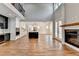 Open floor plan with kitchen featuring large island, hardwood floors, and high ceilings at 3609 Centerville Rosebud Rd, Snellville, GA 30039
