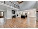 Open concept kitchen boasts a large island, stainless steel appliances, and hardwood floors at 3609 Centerville Rosebud Rd, Snellville, GA 30039
