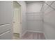 Neutral closet with wire shelving and plush carpeting at 16 Camellia Dr, Fairburn, GA 30213