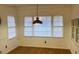 Bright dining room with hardwood floors and large windows at 1461 Fox Forest Sw Ter, Lilburn, GA 30047