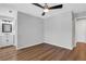 Bedroom with ceiling fan and hardwood floors, en-suite access at 11 Newport Nw Pl, Atlanta, GA 30318