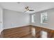 Bright bedroom with hardwood floors and two windows at 11 Newport Nw Pl, Atlanta, GA 30318