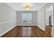 Bright dining room with hardwood floors and neutral walls at 11 Newport Nw Pl, Atlanta, GA 30318