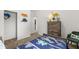 bedroom with twin bed, dinosaur decor, and closet at 2720 Ravencliff Dr, Austell, GA 30168