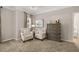 Bedroom sitting area with two armchairs and dresser at 2720 Ravencliff Dr, Austell, GA 30168