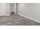 Finished basement area showcasing durable floors, fresh paint, and a modern aesthetic at 2349 Springdale Sw Rd, Atlanta, GA 30315