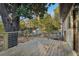 Spacious wooden back porch with cable railing showing a backyard area at 2349 Springdale Sw Rd, Atlanta, GA 30315