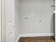 Walk-in closet showcasing hardwood floors and a window for natural light at 2349 Springdale Sw Rd, Atlanta, GA 30315