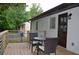 Cozy back porch with modern railings, seating, and a charming view at 2349 Springdale Sw Rd, Atlanta, GA 30315