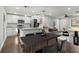 Open-concept living space with modern kitchen, dining area, and comfortable seating, great for entertaining at 2349 Springdale Sw Rd, Atlanta, GA 30315