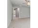 Spacious bedroom with neutral carpet and a ceiling fan at 3102-A Brownstone Se Ln, Atlanta, GA 30354