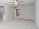 Spacious bedroom with neutral carpet and a ceiling fan at 3102-A Brownstone Se Ln, Atlanta, GA 30354