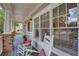 Inviting front porch with rocking chairs and brick accents at 3330 Madison St, Atlanta, GA 30337