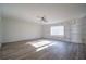 Bright living room with built-in shelving and hardwood floors at 6724 Oakland Dr, Douglasville, GA 30135