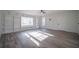 Sunlit living room with built-ins and stone accent wall at 6724 Oakland Dr, Douglasville, GA 30135