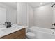 Modern bathroom featuring sleek fixtures, tiled shower, and spacious vanity for a spa-like experience at 7675 Homer Dr, Cumming, GA 30028