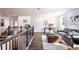 Inviting loft space with hardwood floors, perfect for a home office or additional seating area at 7675 Homer Dr, Cumming, GA 30028