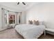 Bright and airy bedroom with a king-size bed and bay windows at 375 Highland Ne Ave # 908, Atlanta, GA 30312