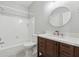 Traditional bathroom with a tiled tub-shower combination and vanity at 2195 Lake Shore Lndg, Alpharetta, GA 30005